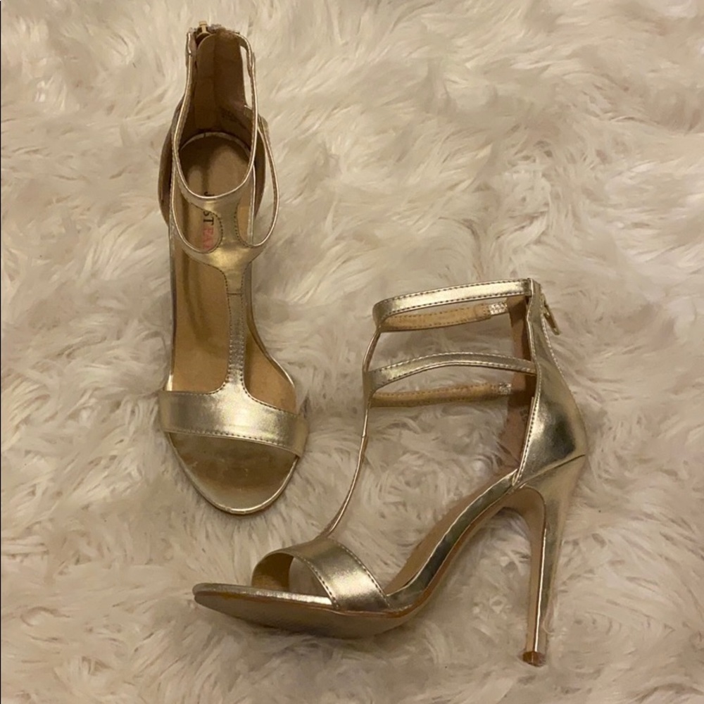 gold metal strapped high heels never worn